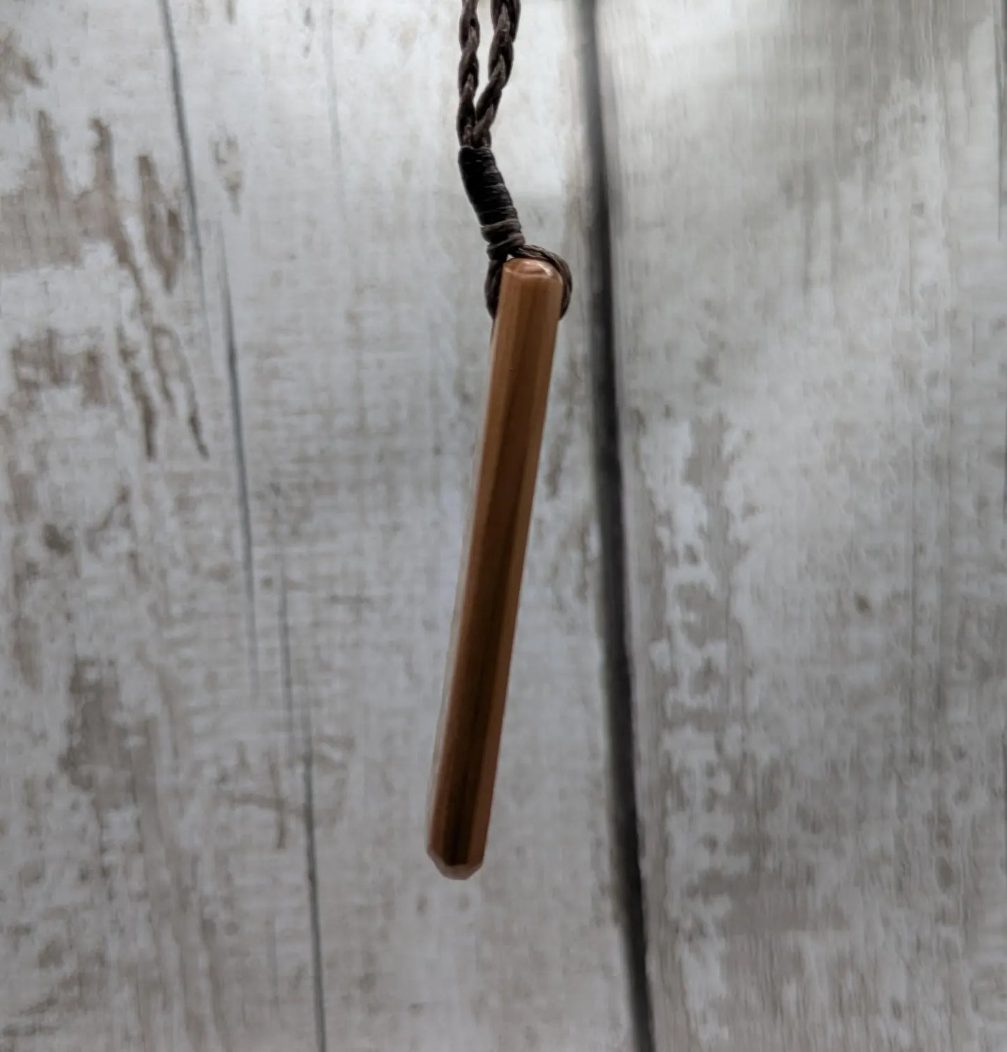 Yew Wood roimata drop pendant with Moldavite Inlay.