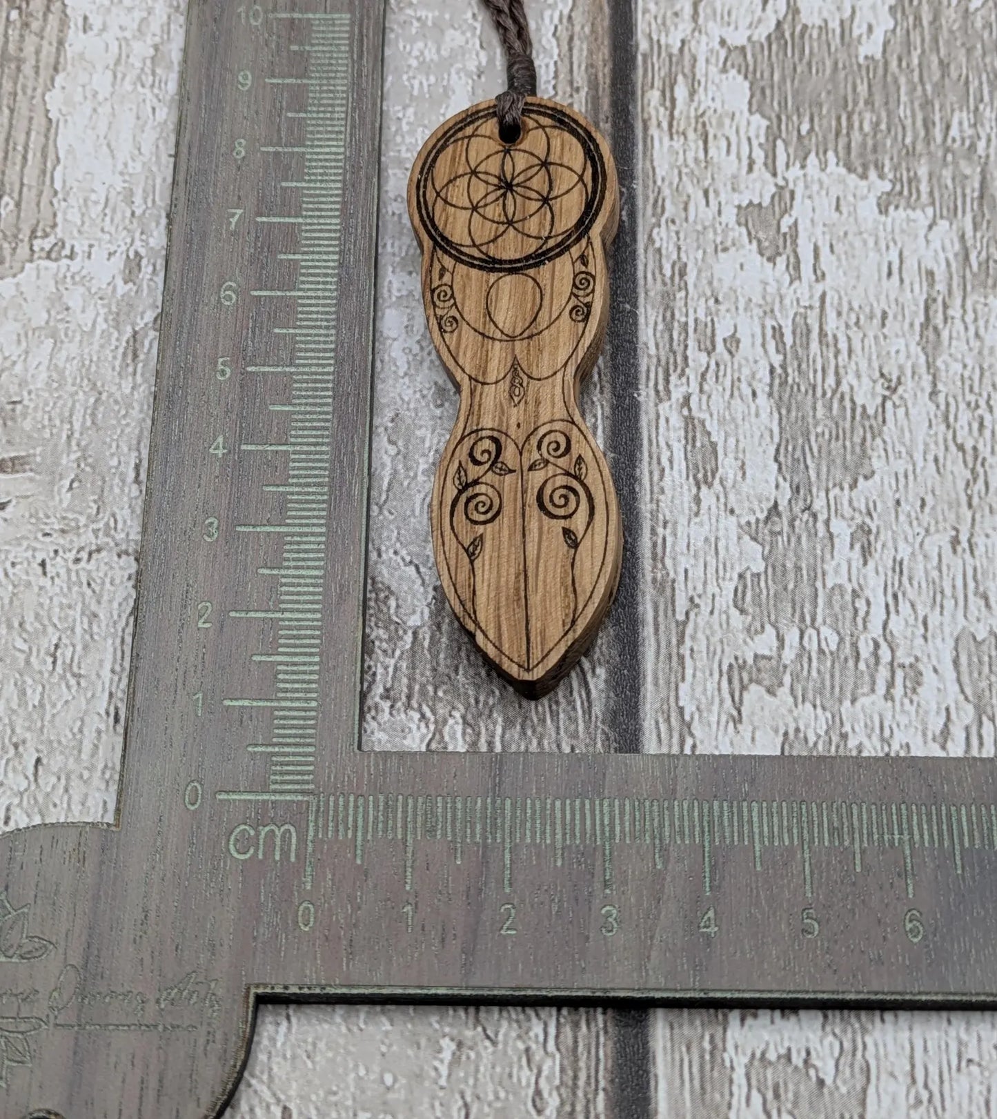 Oak wood laser printed tattooed goddess pendant.