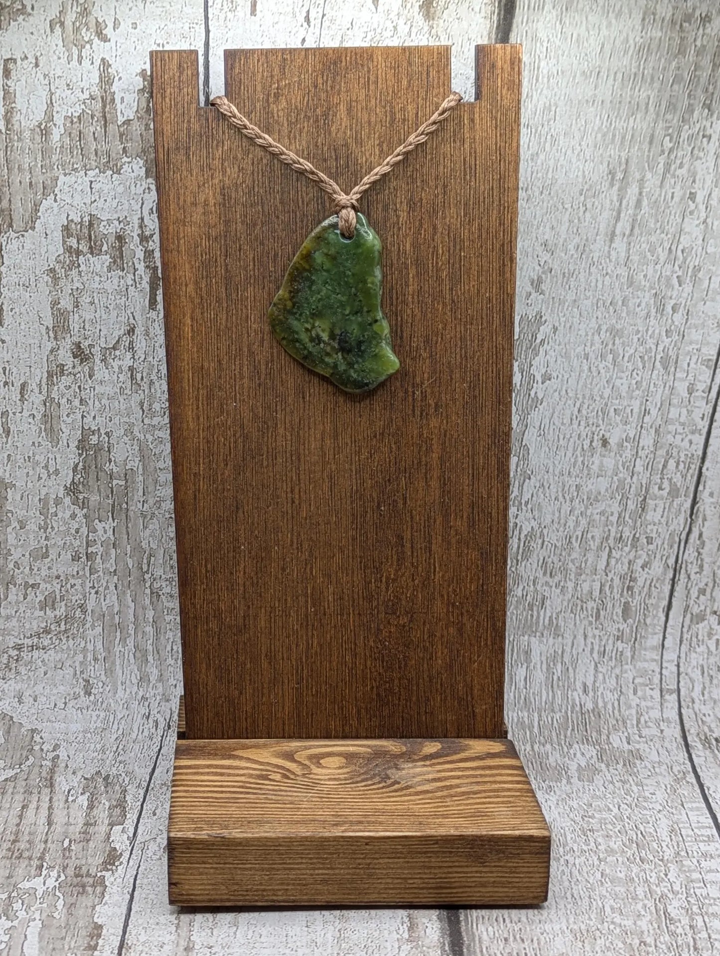 nz tumbled pounamu greenstone jade pendant.