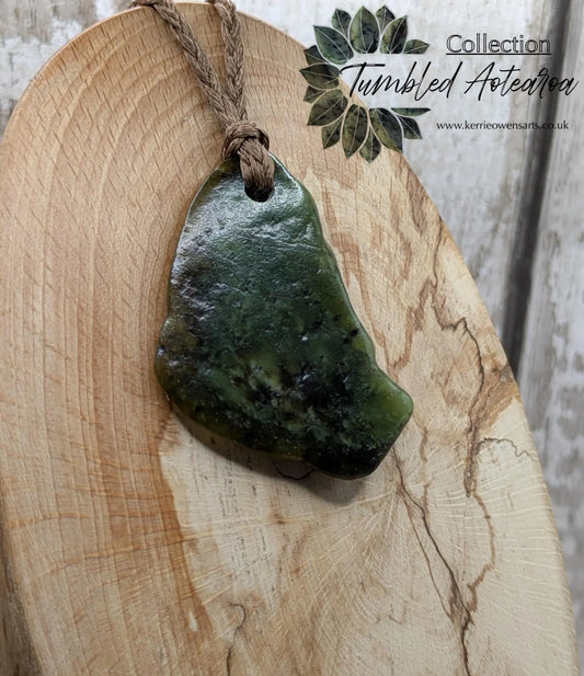 nz tumbled pounamu greenstone jade pendant.