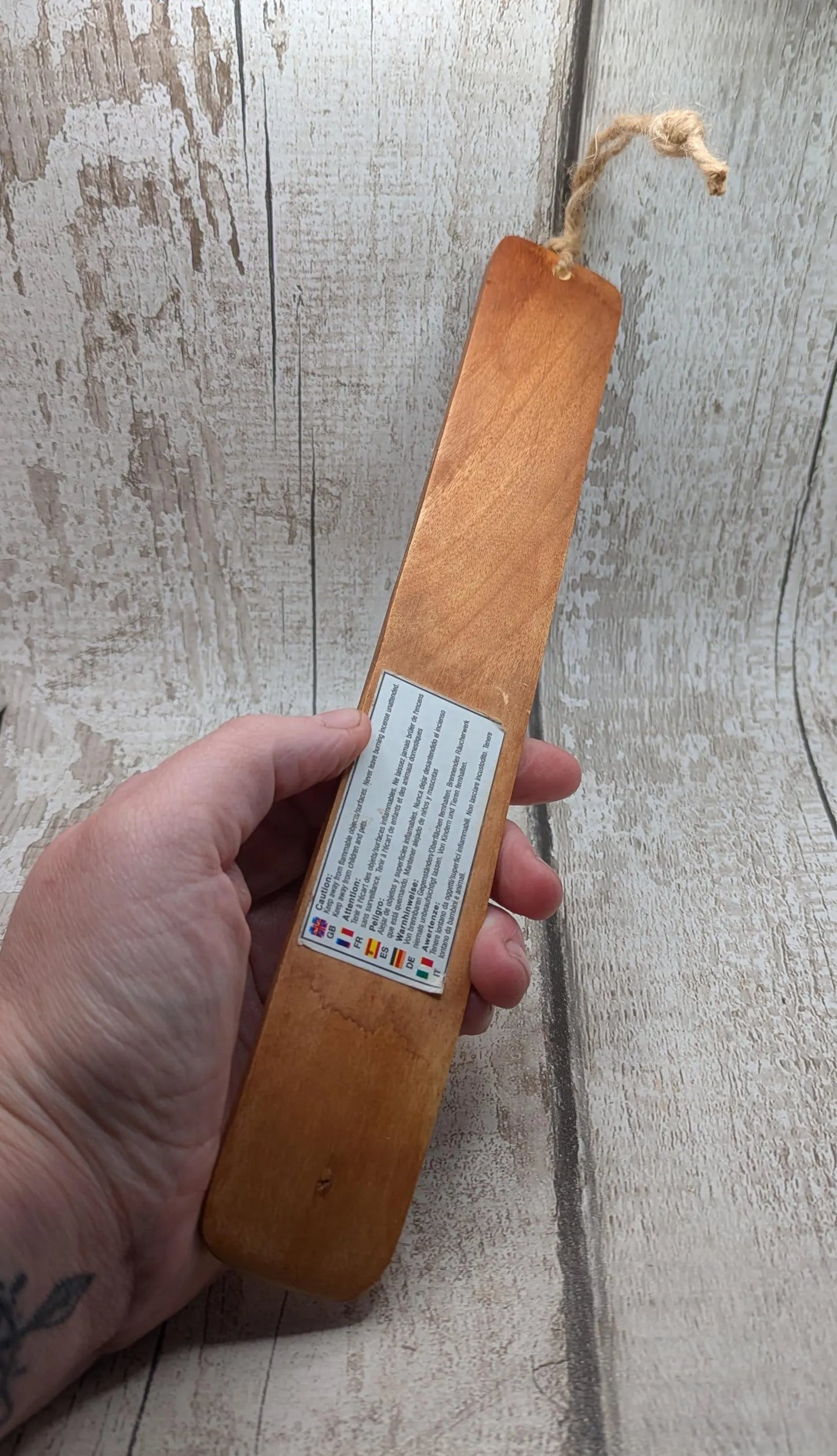 Recycled mango wood laser printed incense stick holders.