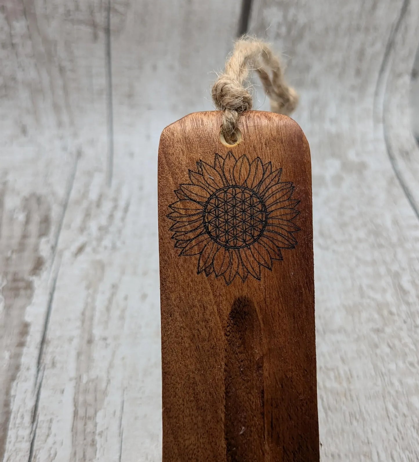 Recycled mango wood laser printed incense stick holders.