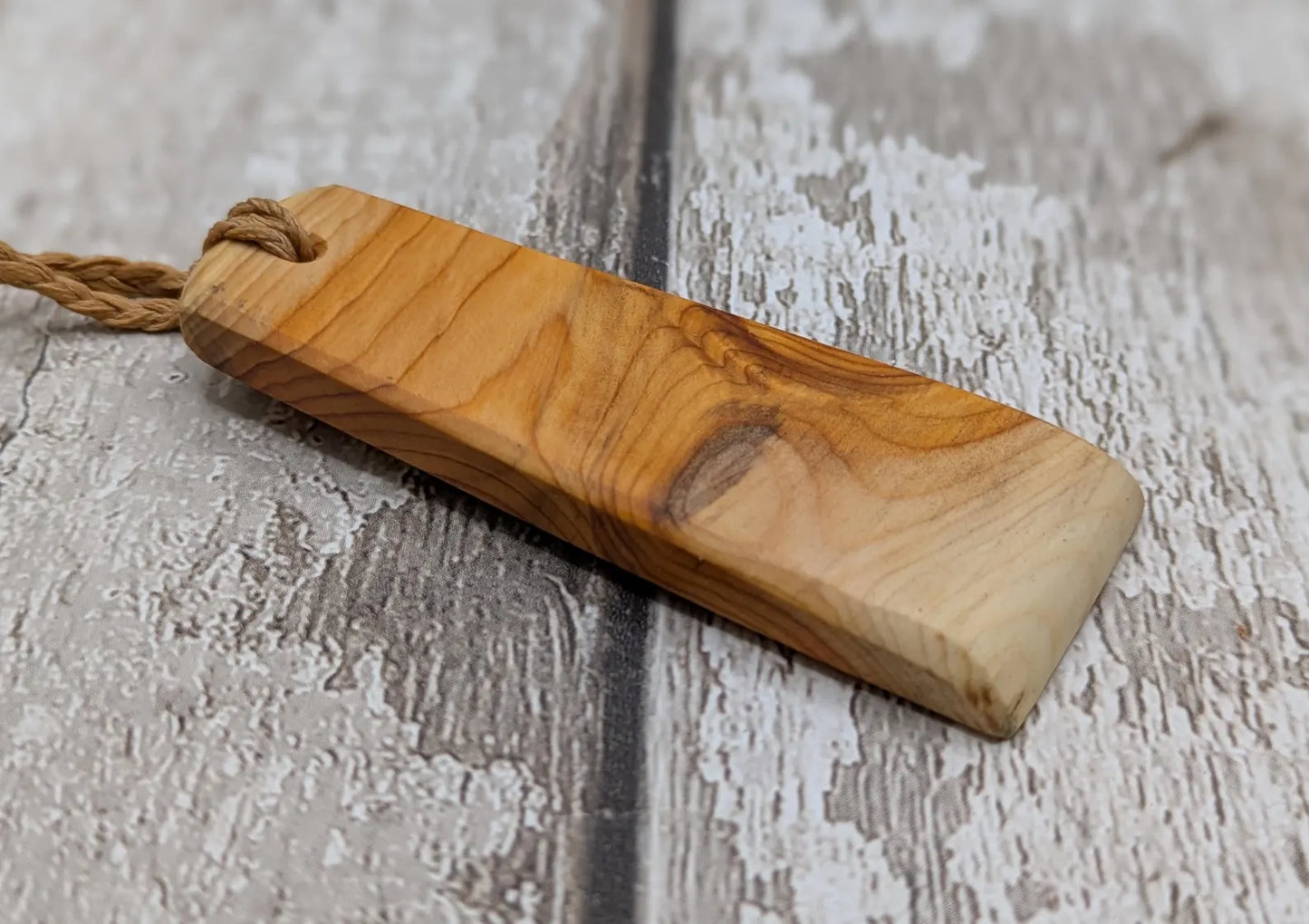 Yew wood toki adze style hand carved pendant