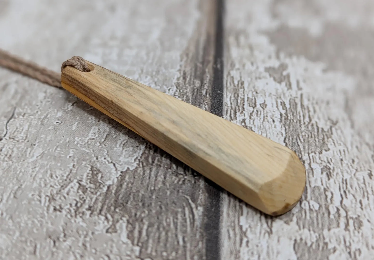 Yew wood hand crafted toki adze style pendant