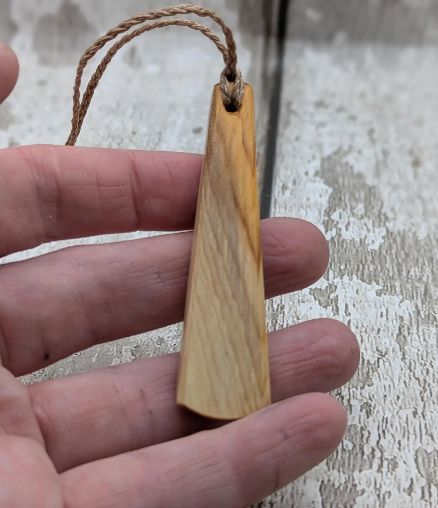 Yew wood hand crafted toki adze style pendant