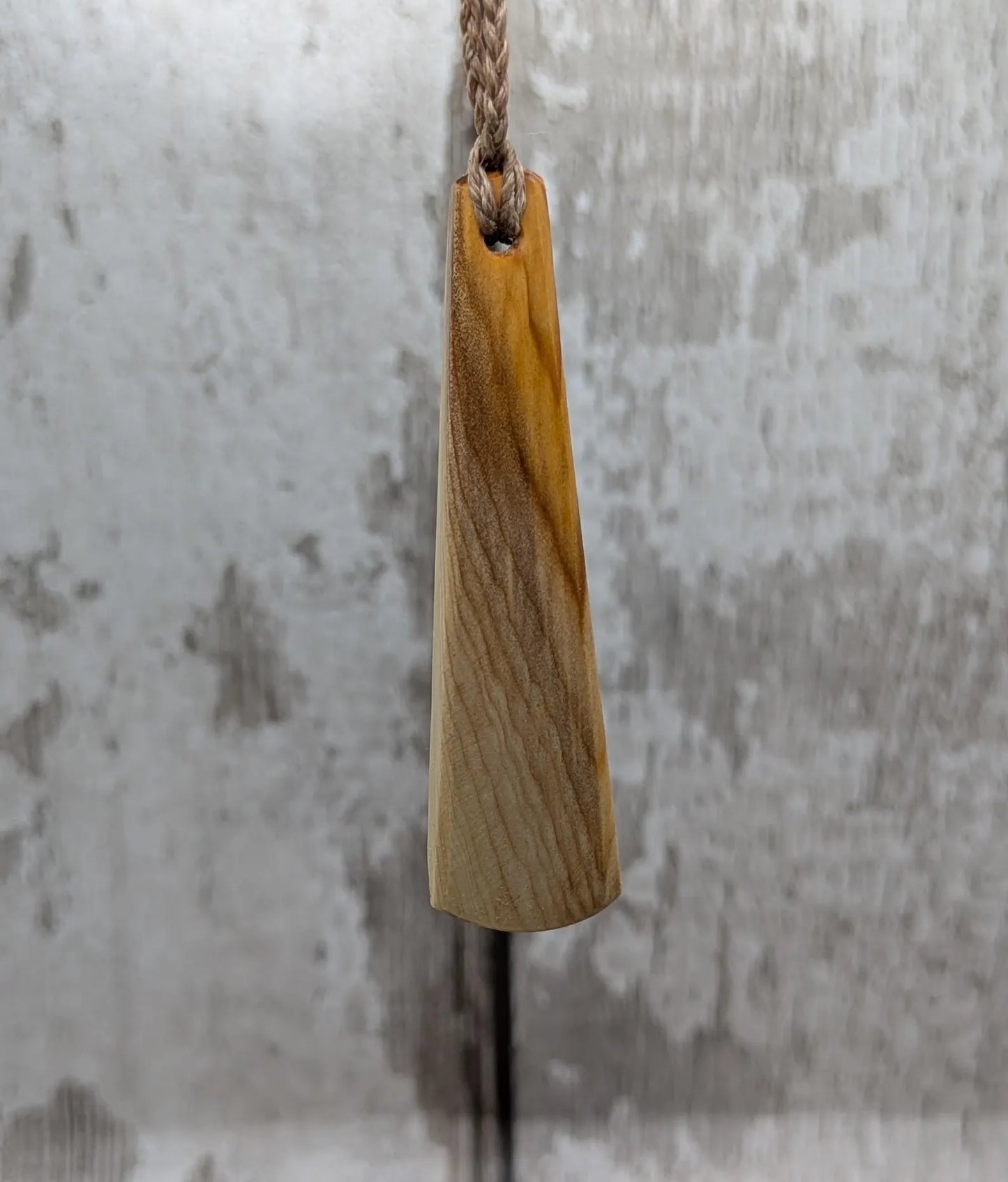 Yew wood hand crafted toki adze style pendant