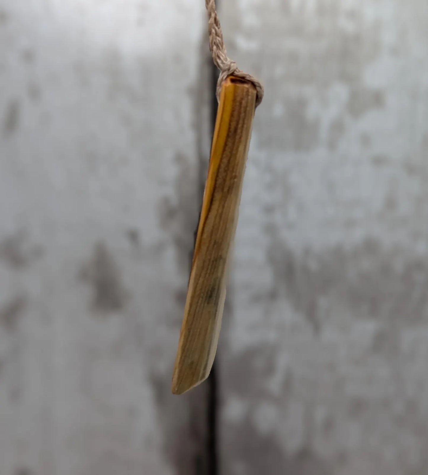Yew wood hand crafted toki adze style pendant