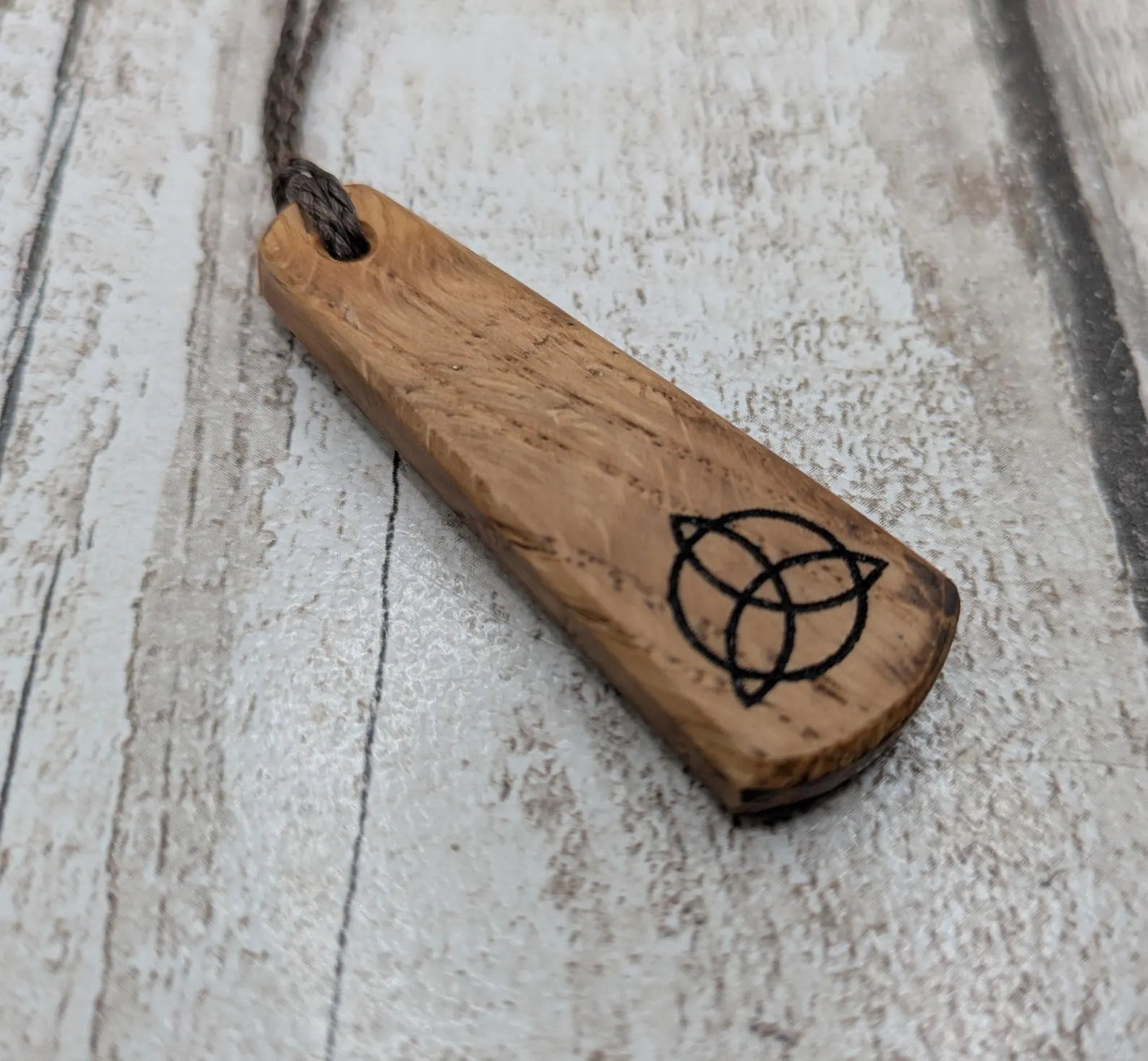 Oak wood laser printed roimata tear drop pendant.