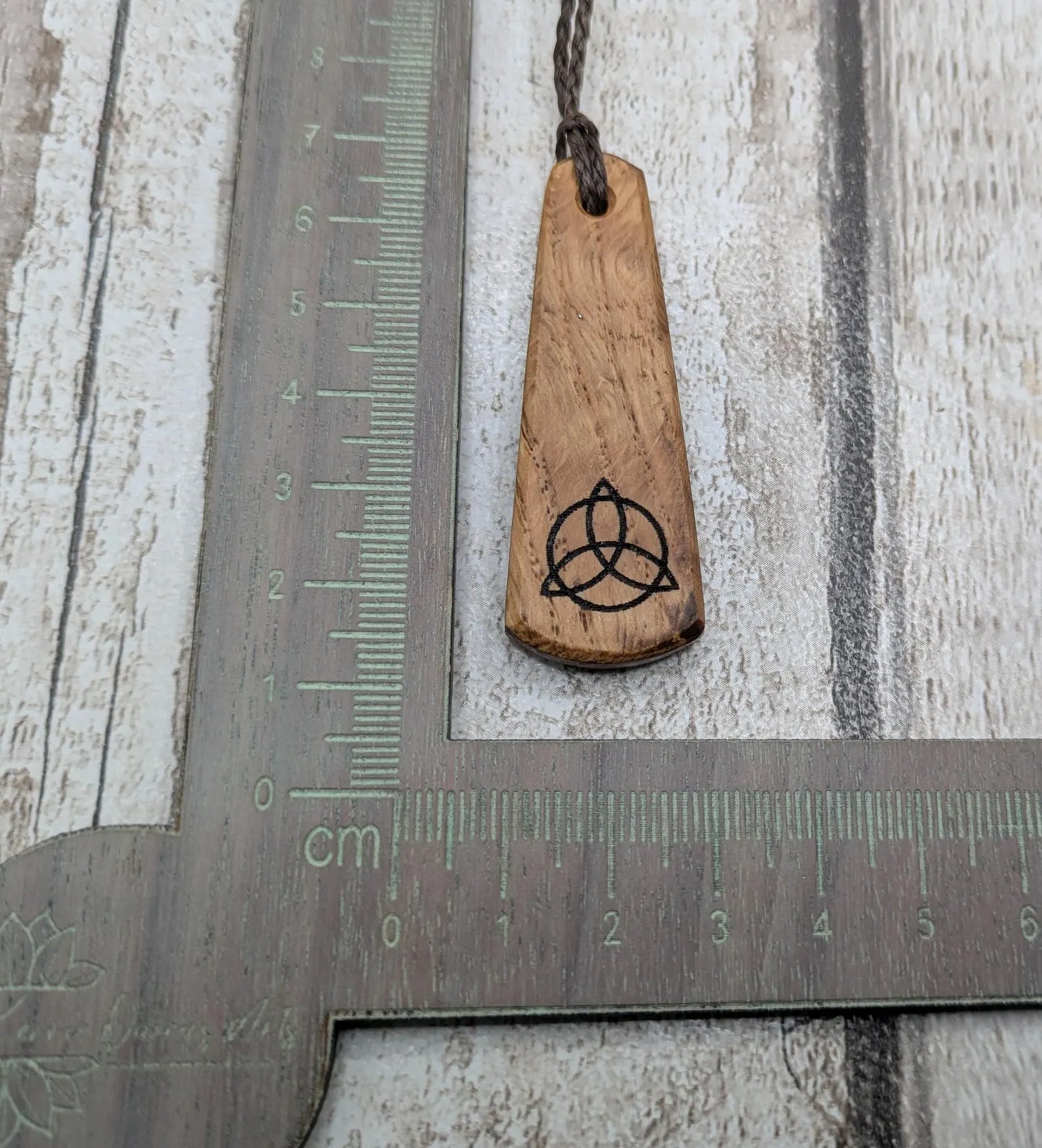 Oak wood laser printed roimata tear drop pendant.