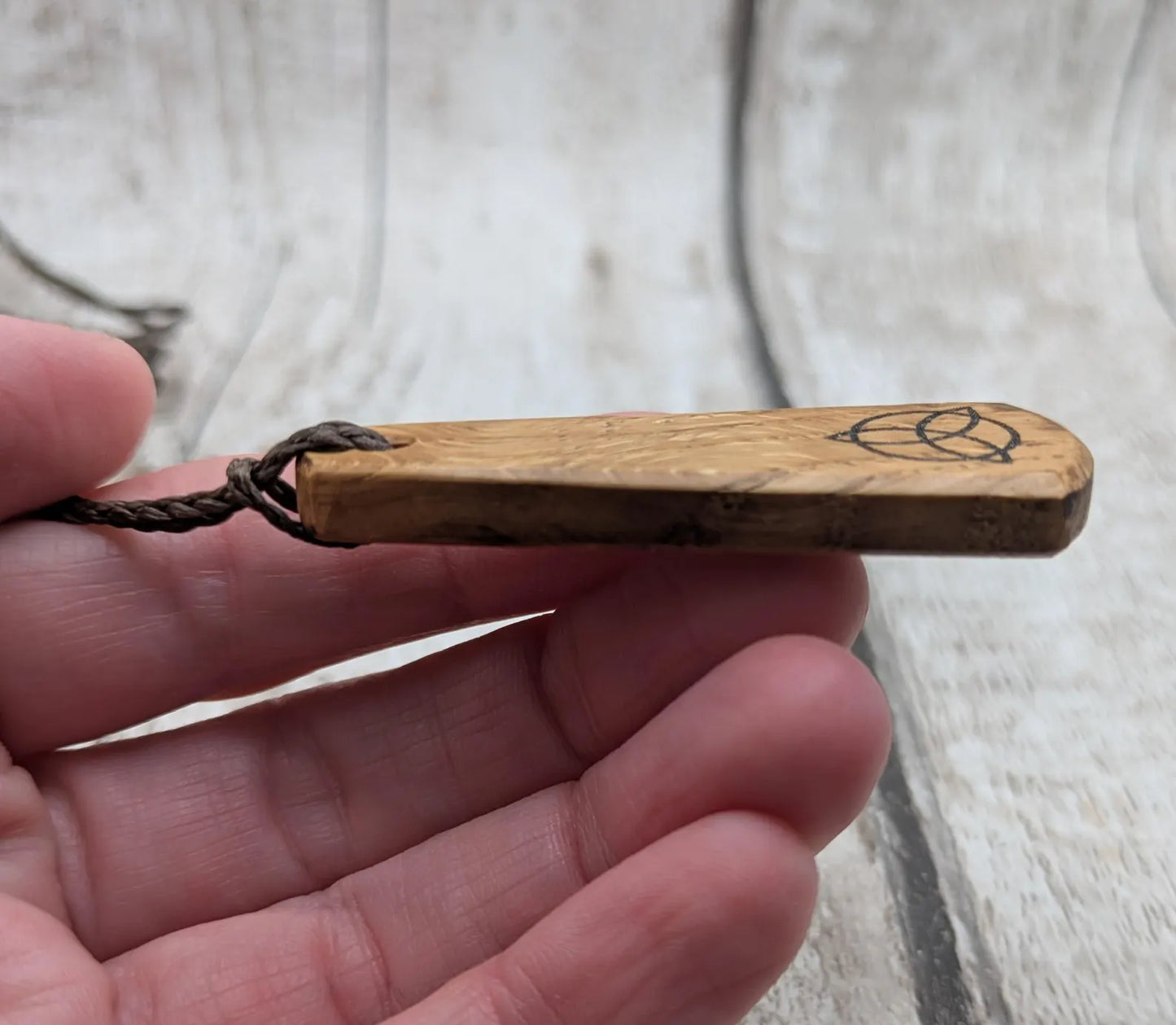 Oak wood laser printed roimata tear drop pendant.