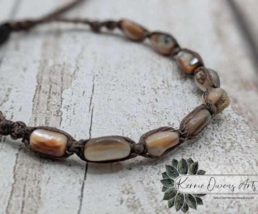 Abalone shell chip beaded adjustable bracelet.