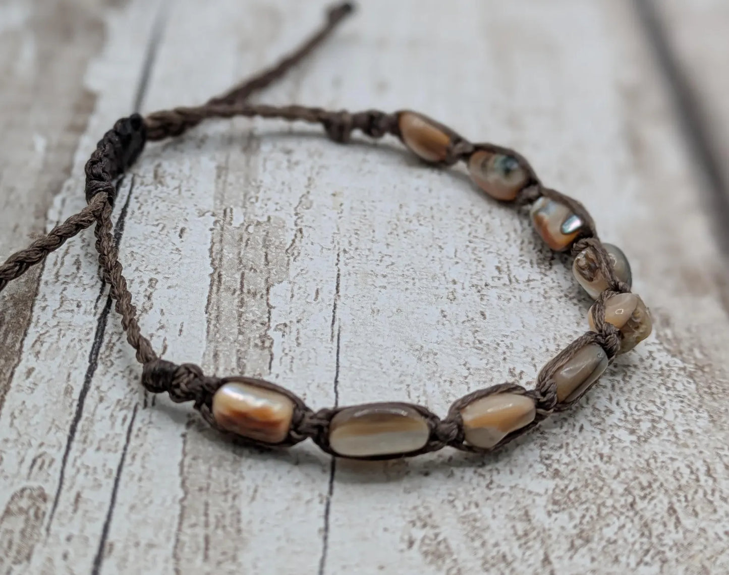 Abalone shell chip beaded adjustable bracelet.
