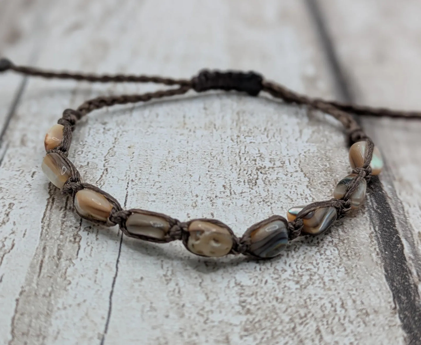 Abalone shell chip beaded adjustable bracelet.