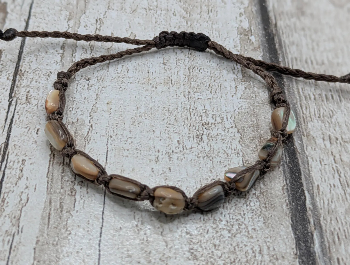 Abalone shell chip beaded adjustable bracelet.