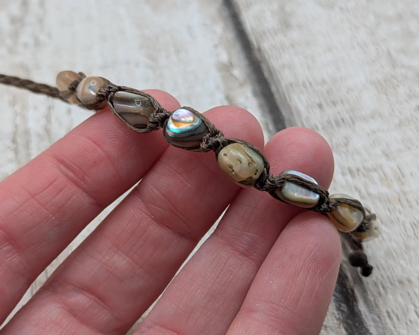 Abalone shell chip beaded adjustable bracelet.