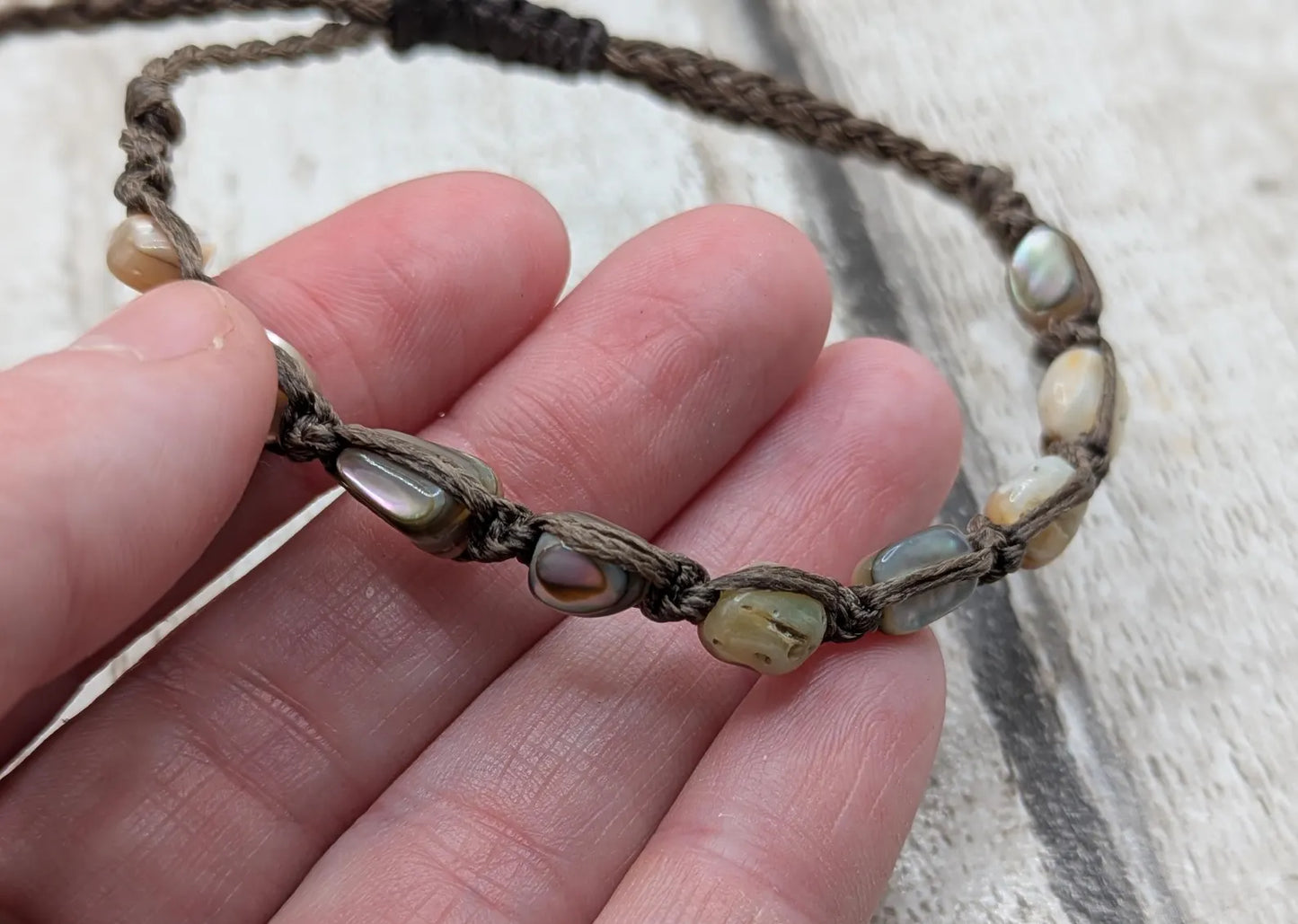 Abalone shell chip beaded adjustable bracelet.