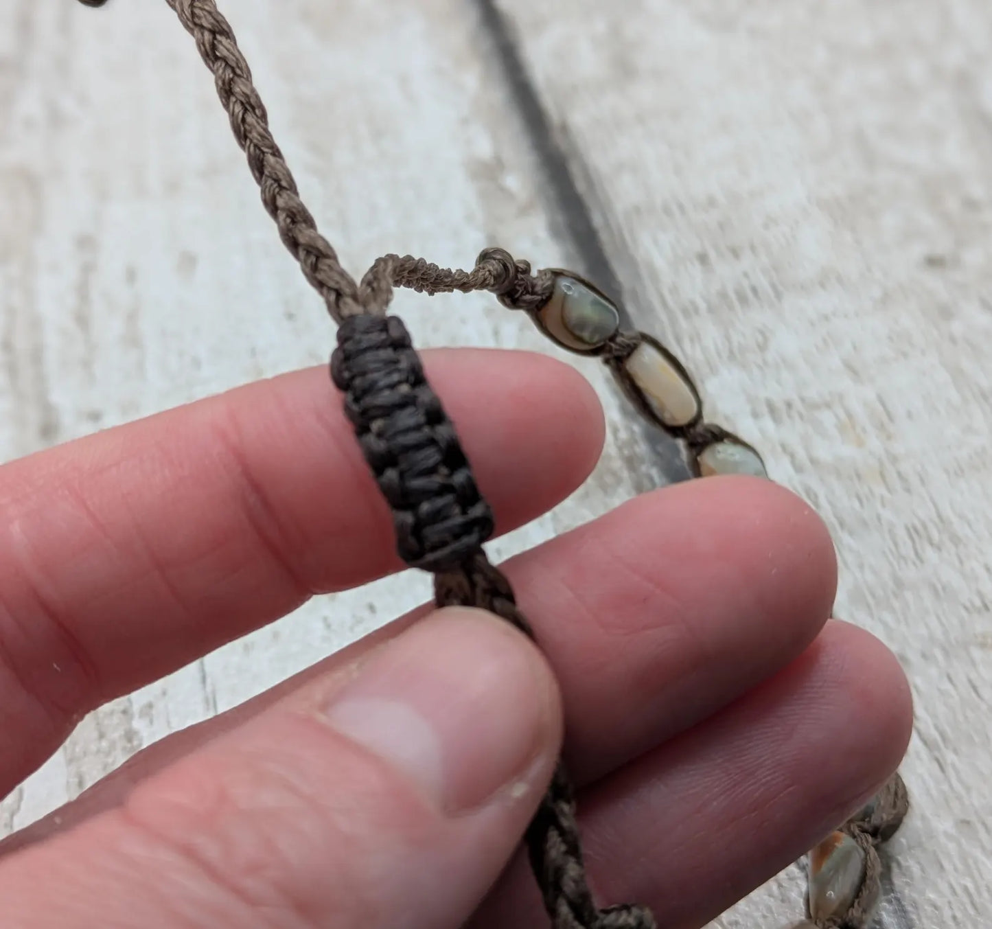 Abalone shell chip beaded adjustable bracelet.