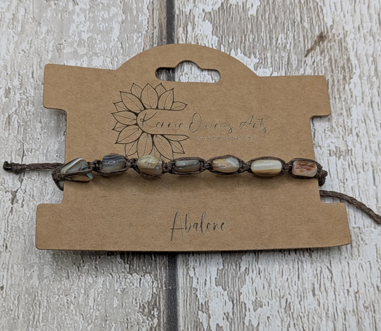 Abalone shell chip beaded adjustable bracelet.