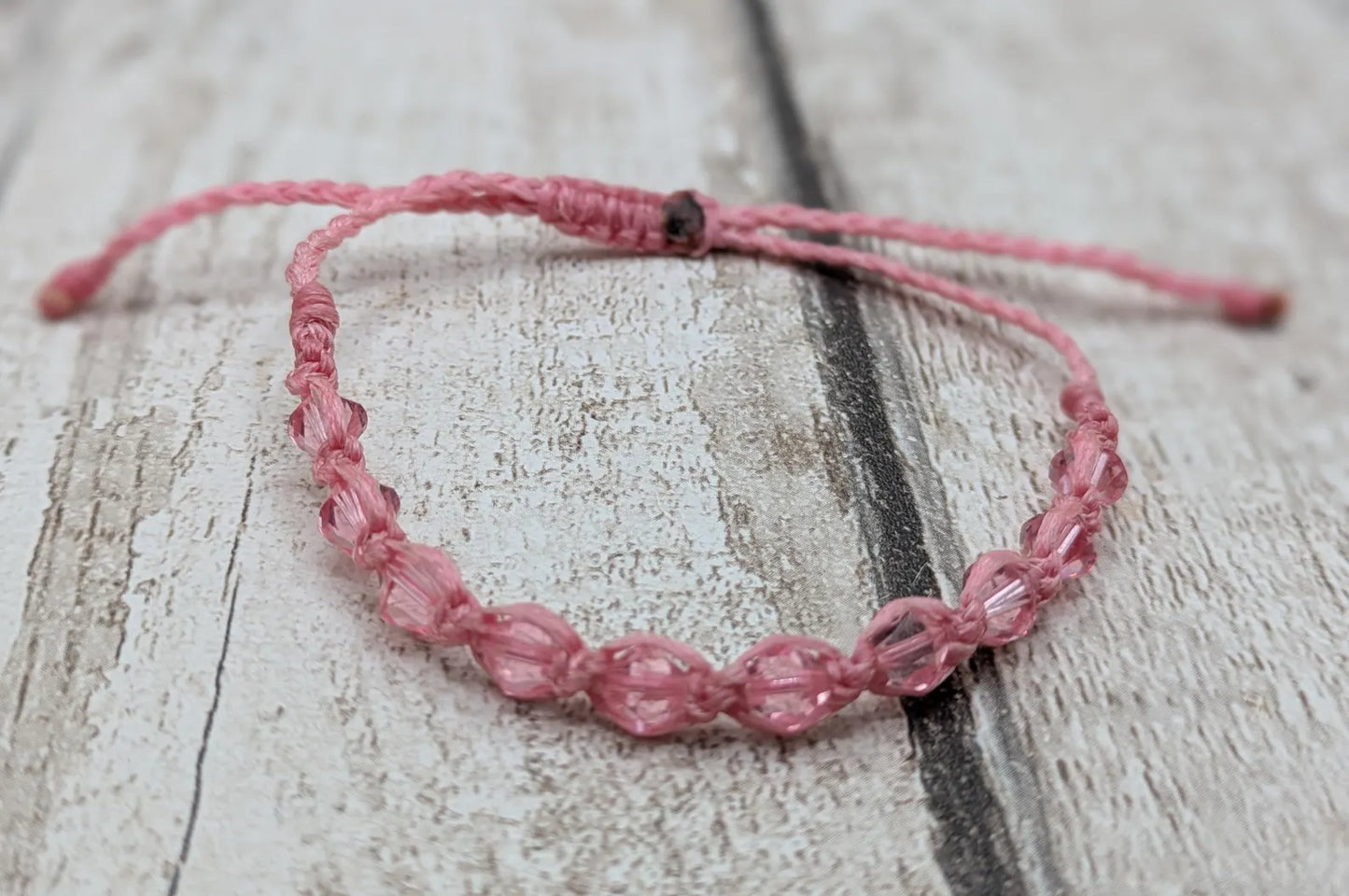 Pink faceted glass beaded macramé woven adjustable bracelet