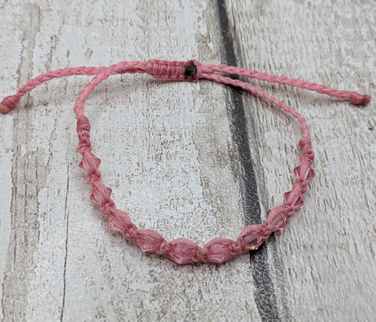 Pink faceted glass beaded macramé woven adjustable bracelet