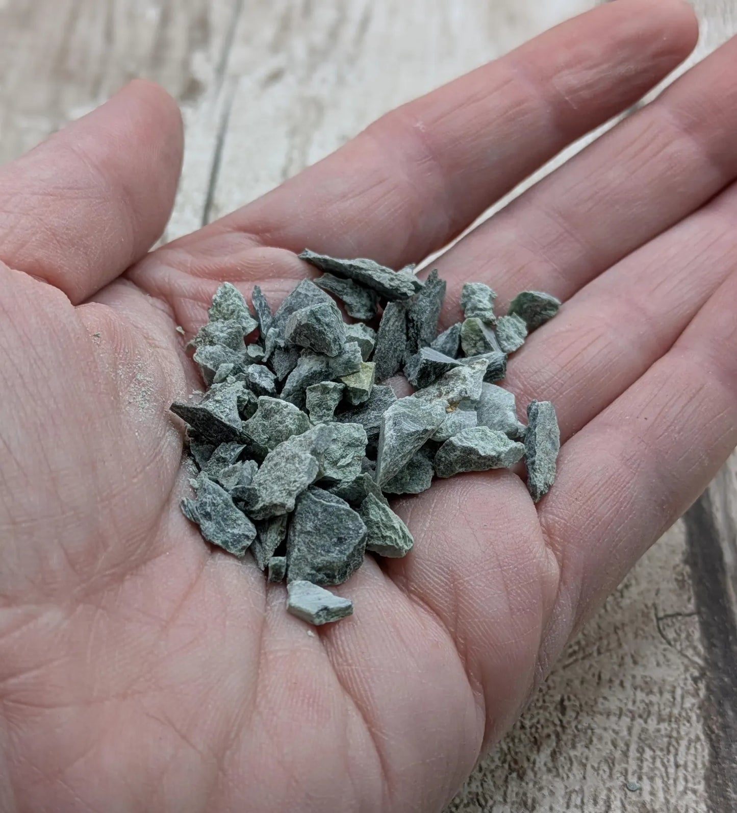 Mixed New Zealand pounamu chips for spell work and inlay.