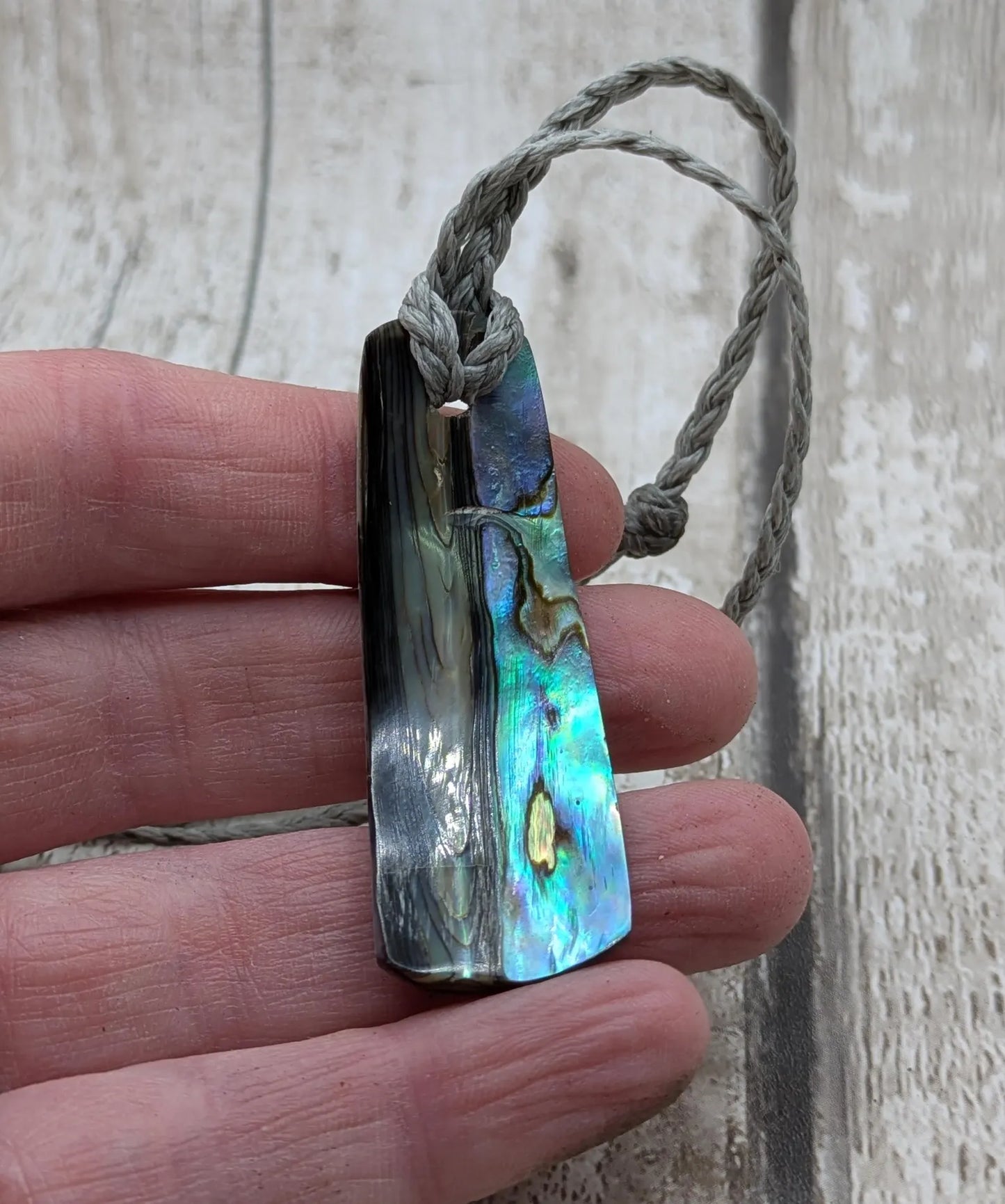 New Zealand Pāua shell pendant.