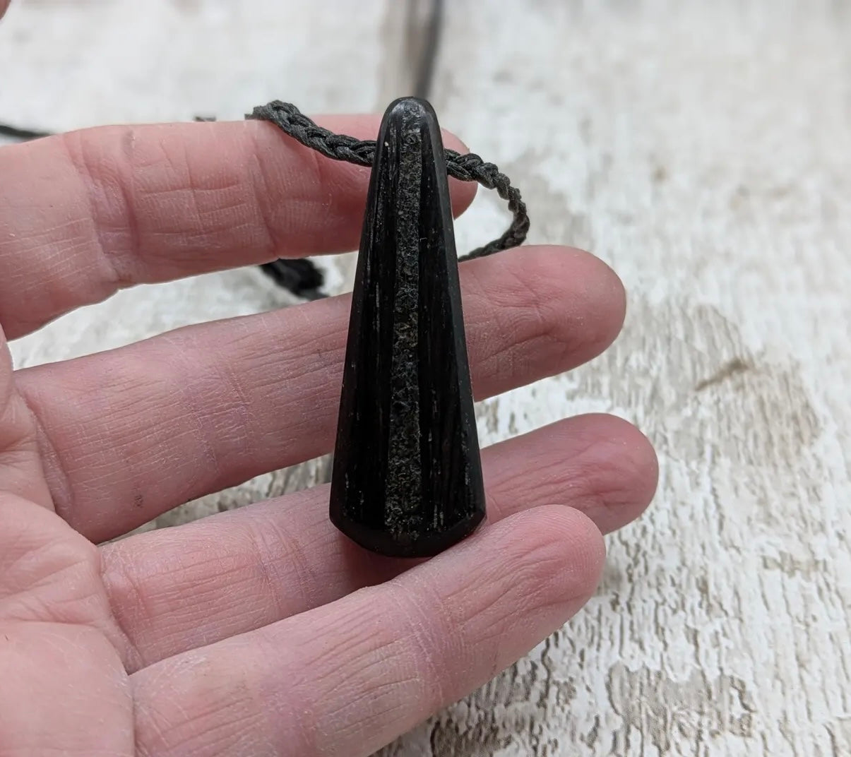 Fenland bog oak with Preseli bluestone roimata pendant.