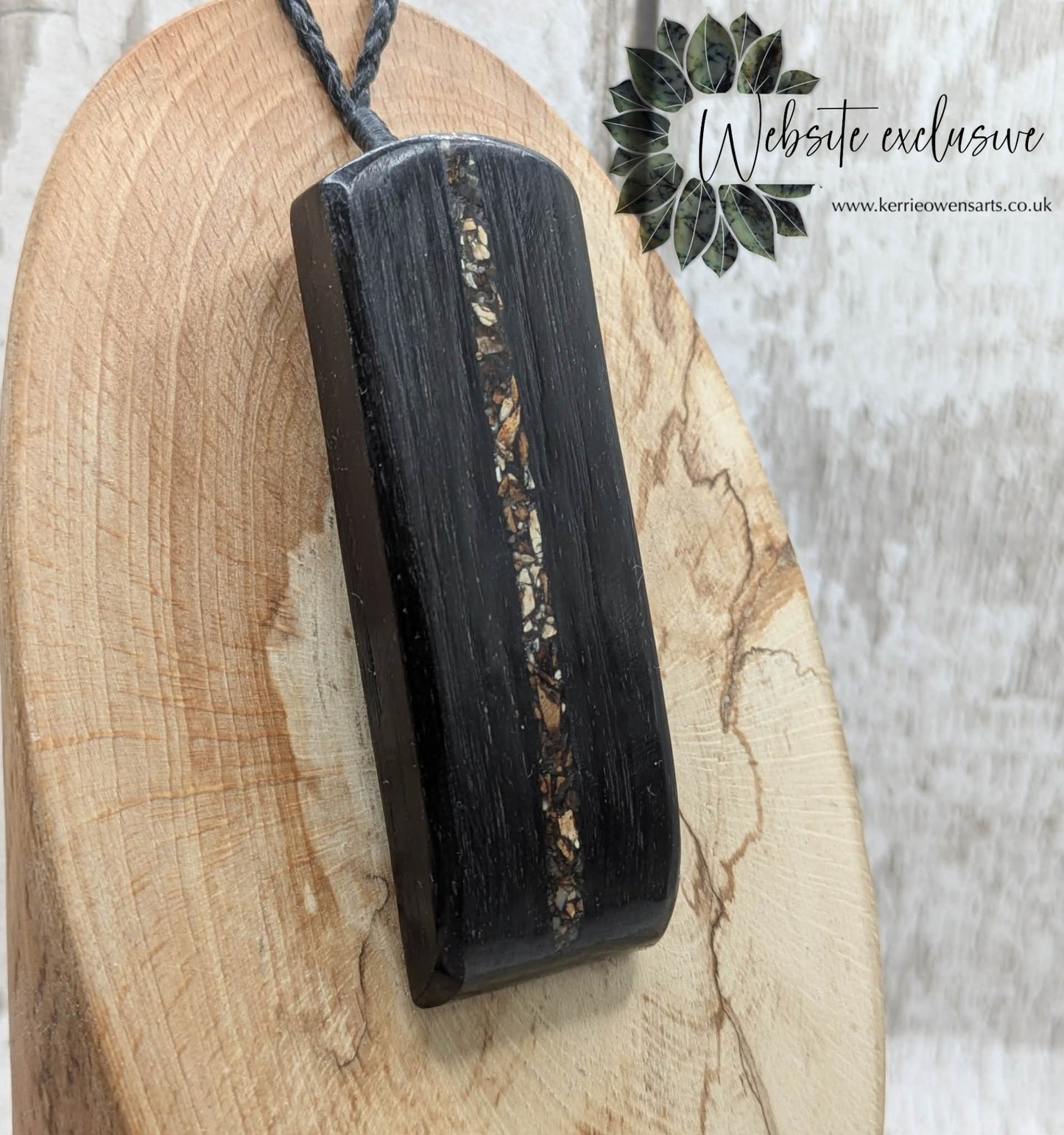 Fenland bog oak and mammoth ivory Toki adze style pendant.