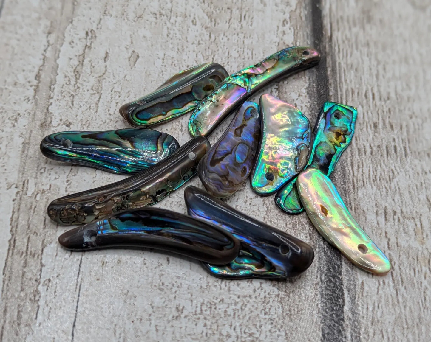 10 new Zealand rainbow pāua abalone shell beads.