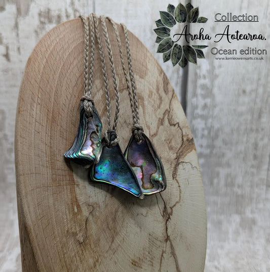 New Zealand rainbow paua abalone shell tumbled offcut unisex pendant.
