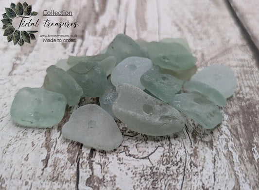 Teal sea glass central drilled beads.