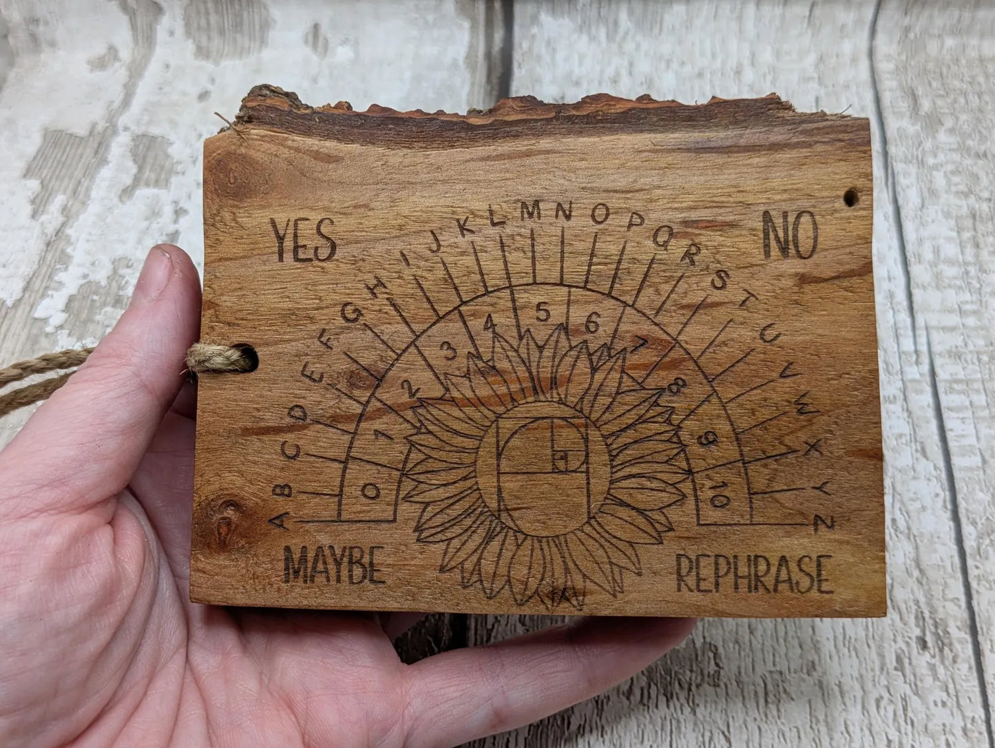 Alder wood pendulum divination board With sunflower design.