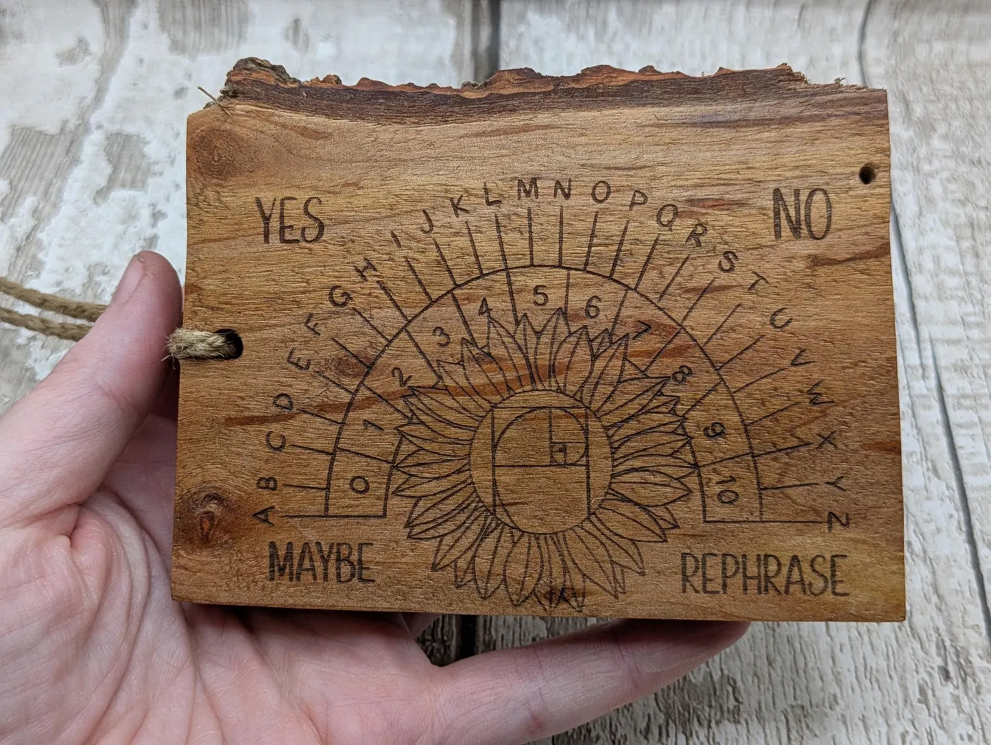 Alder wood pendulum divination board With sunflower design.