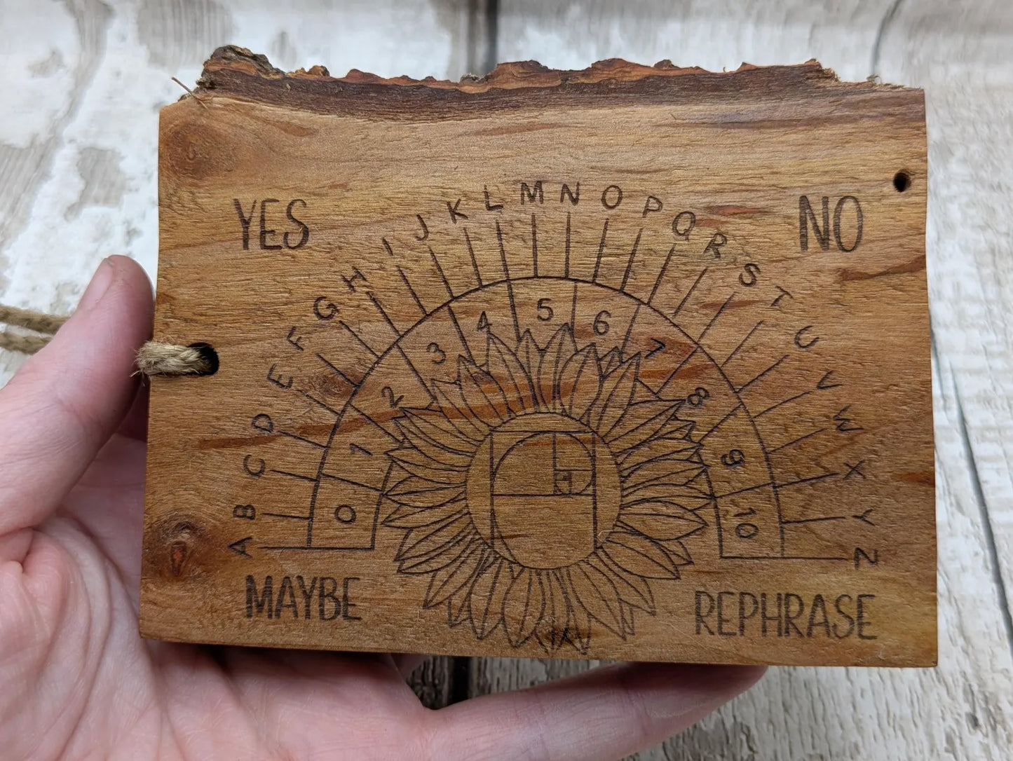 Alder wood pendulum divination board With sunflower design.