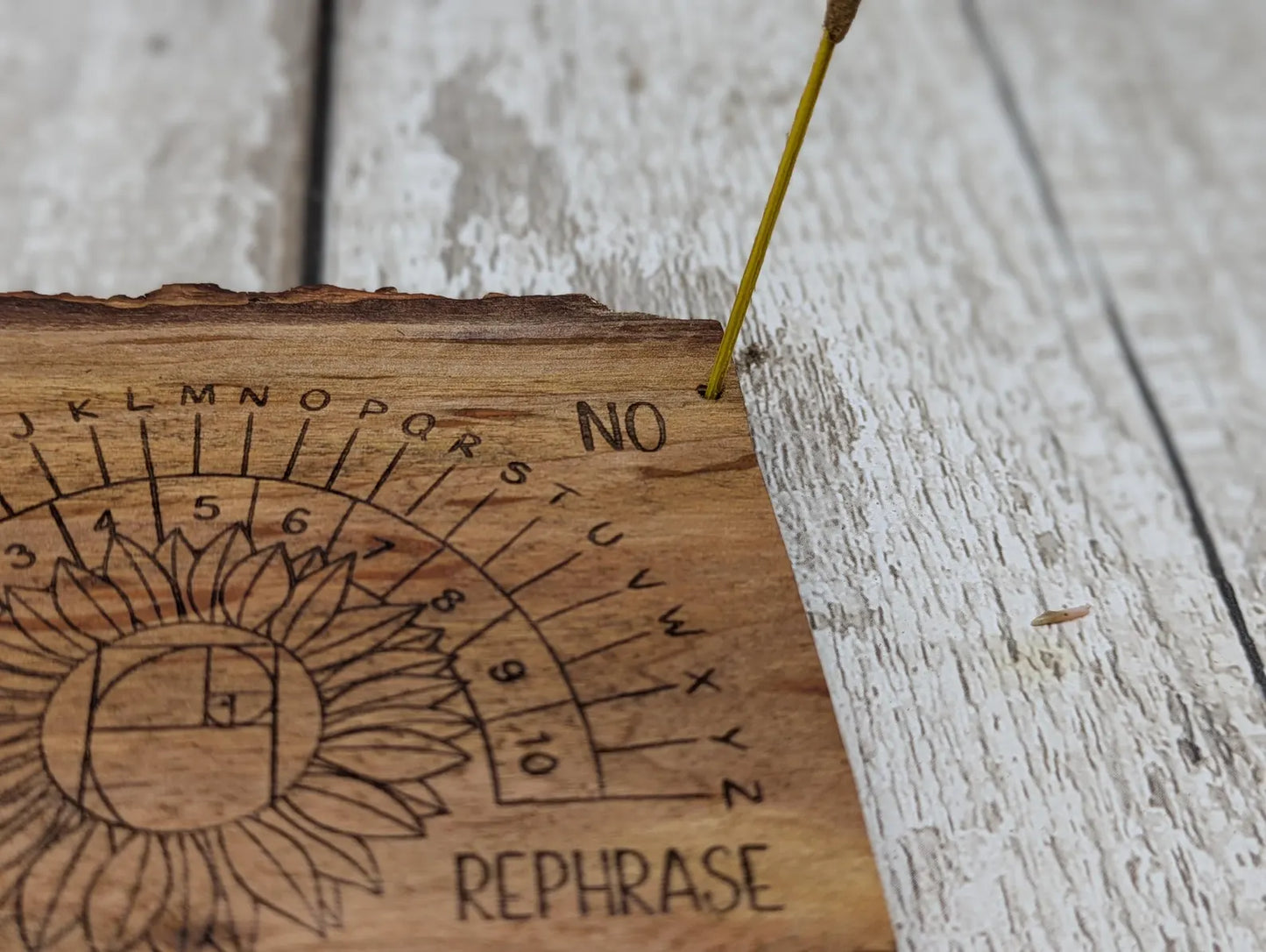 Alder wood pendulum divination board With sunflower design.