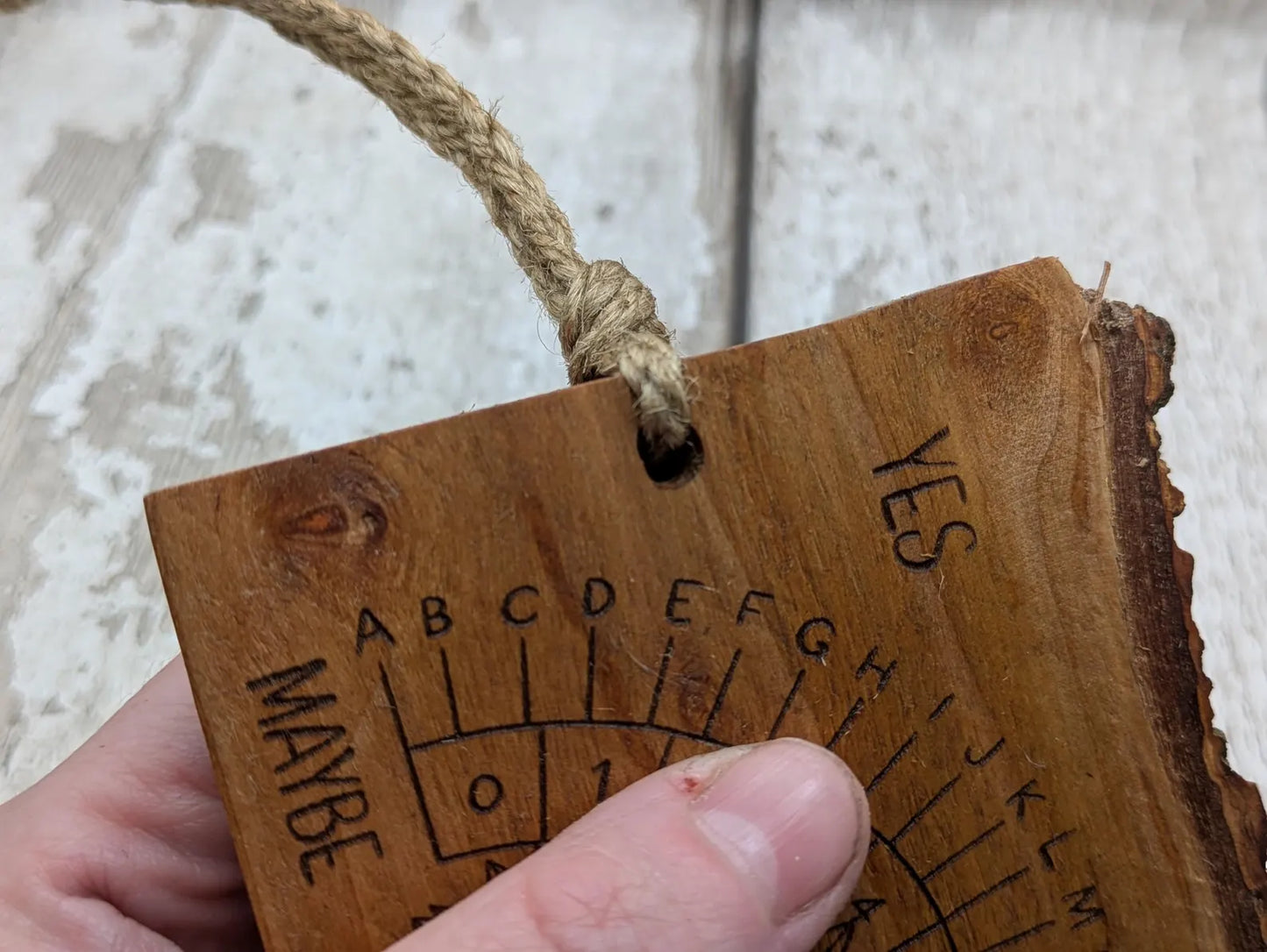 Alder wood pendulum divination board With sunflower design.