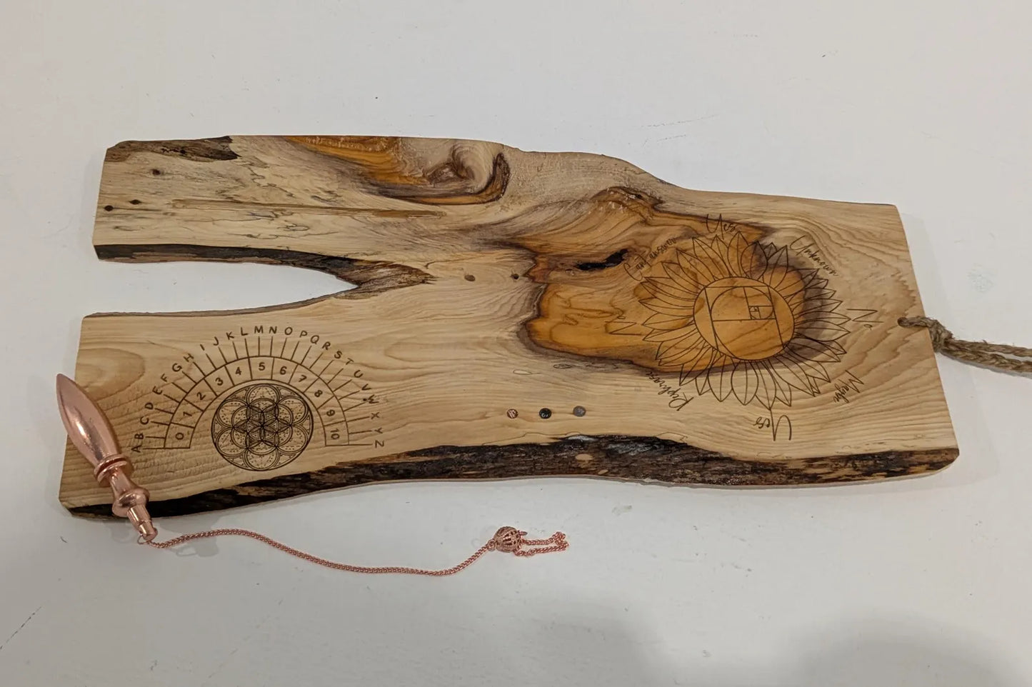Yew wood mini altar board and pendulum dowsing board with sunflower details.