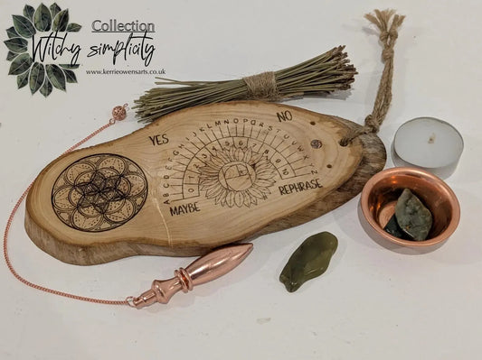 Ash wood laser printed pendulum dowsing board with sunflower detail.
