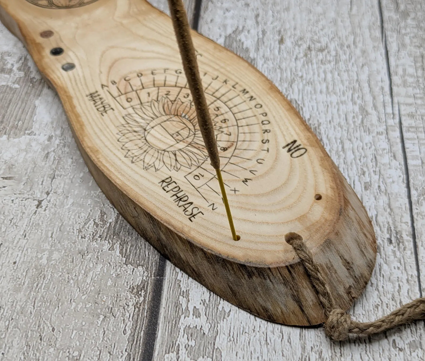Ash wood pendulum dowsing pendulum board laser printed, with sunflower design.