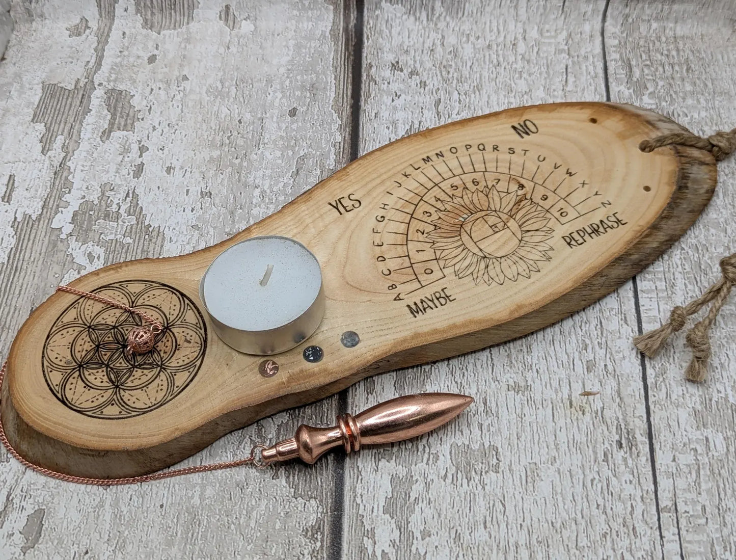 Ash wood pendulum dowsing pendulum board laser printed, with sunflower design.