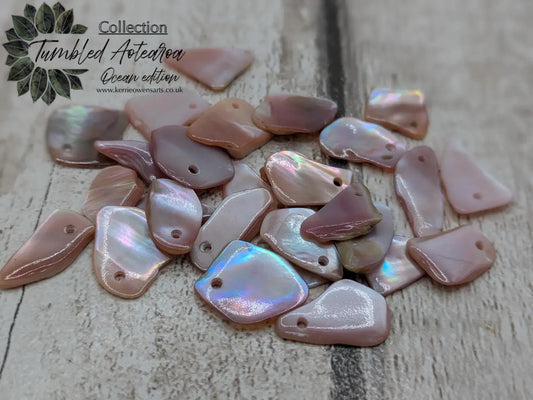 New Zealand top drilled tumbled pink fresh water mussel shell.