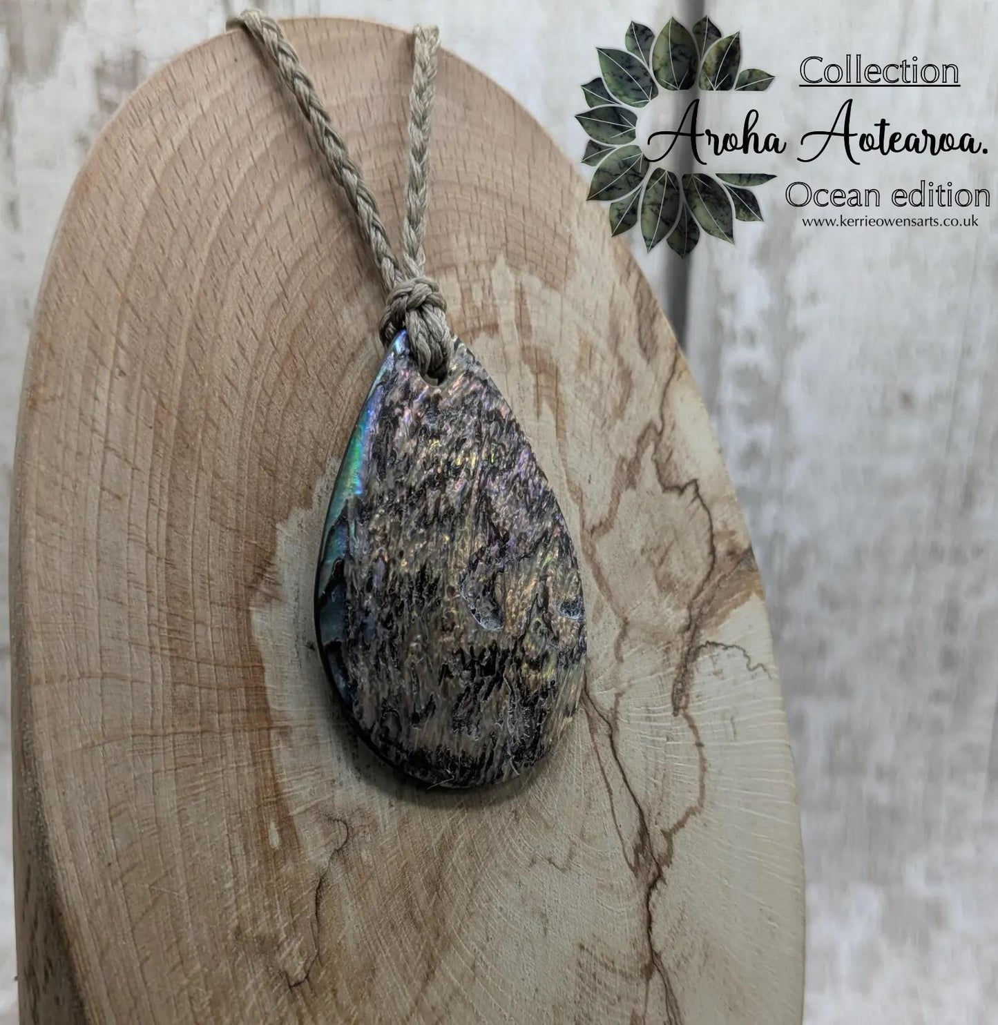 Carved NZ Pāua Shell Oval Pendant – Handcrafted Rainbow Abalone Jewel, Ocean-Inspired fashion, iridescent amulet.