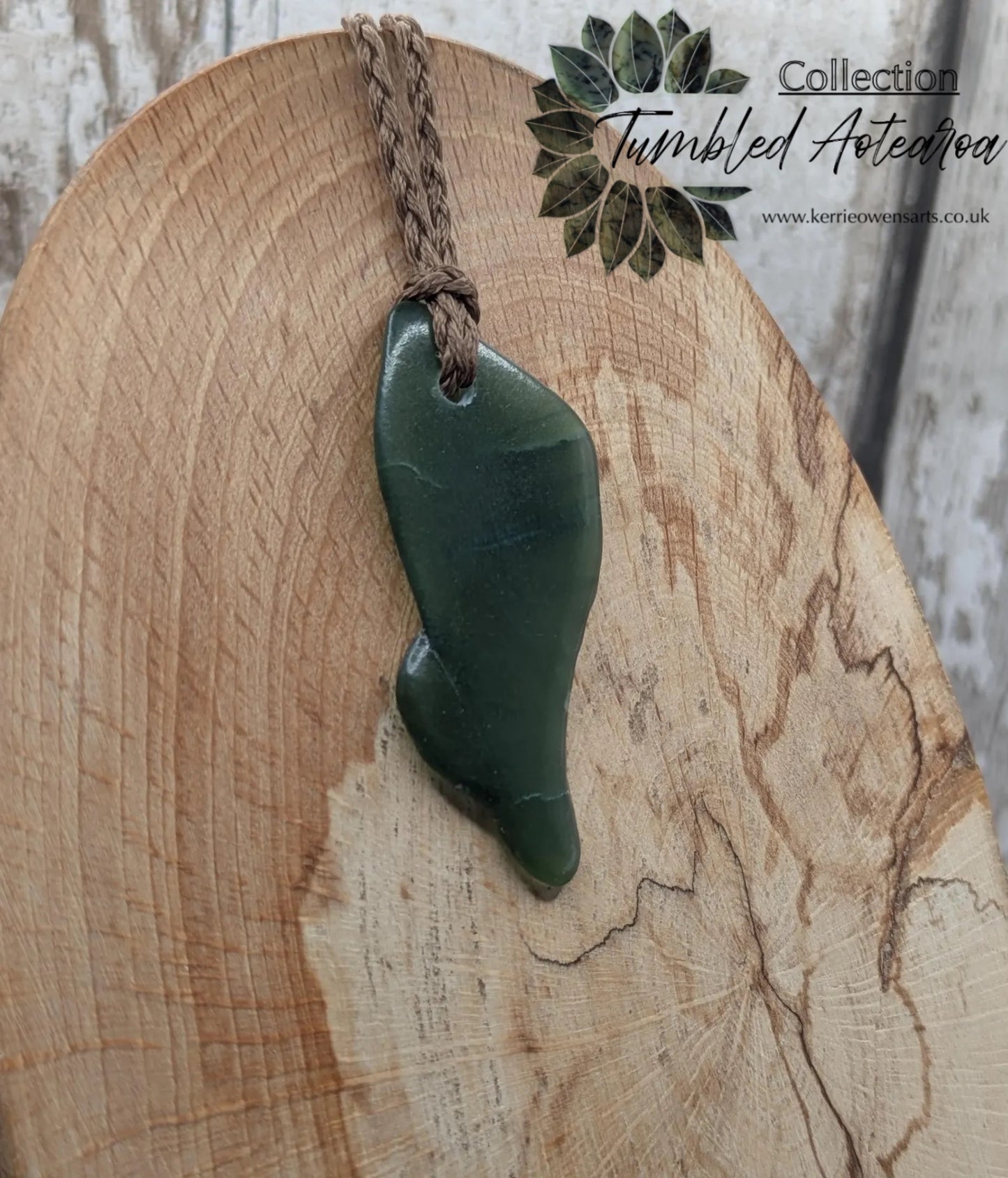 nz tumbled pounamu greenstone jade pendant.