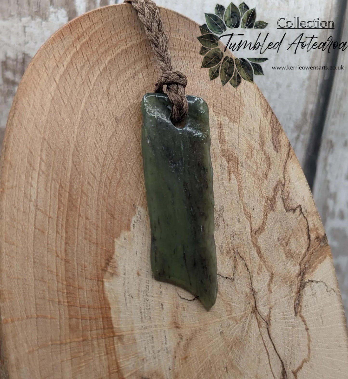 Tumbled Pounamu nephrite jade pendant.