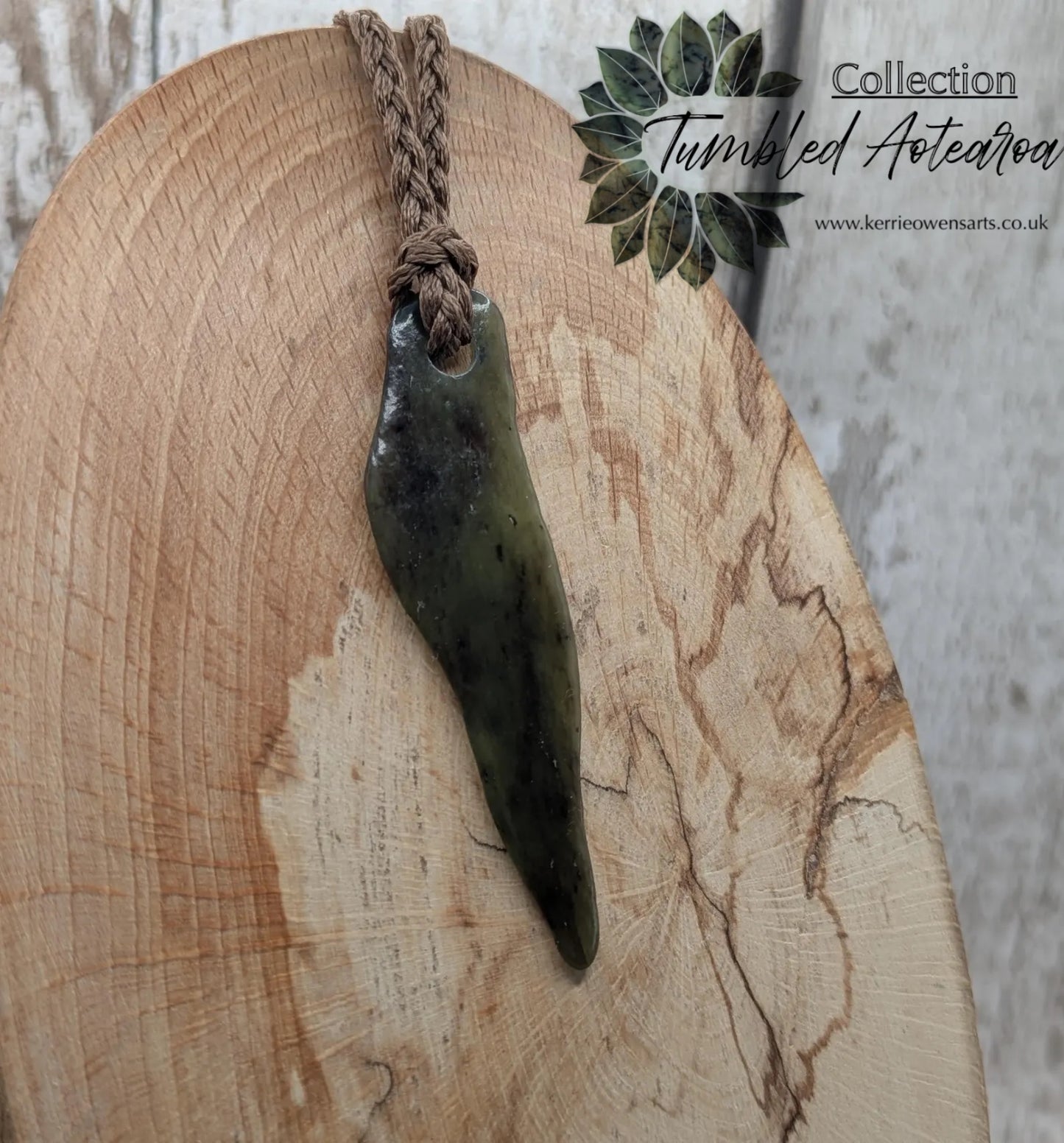 Tumbled New Zealand Pounamu greenstone pendant.