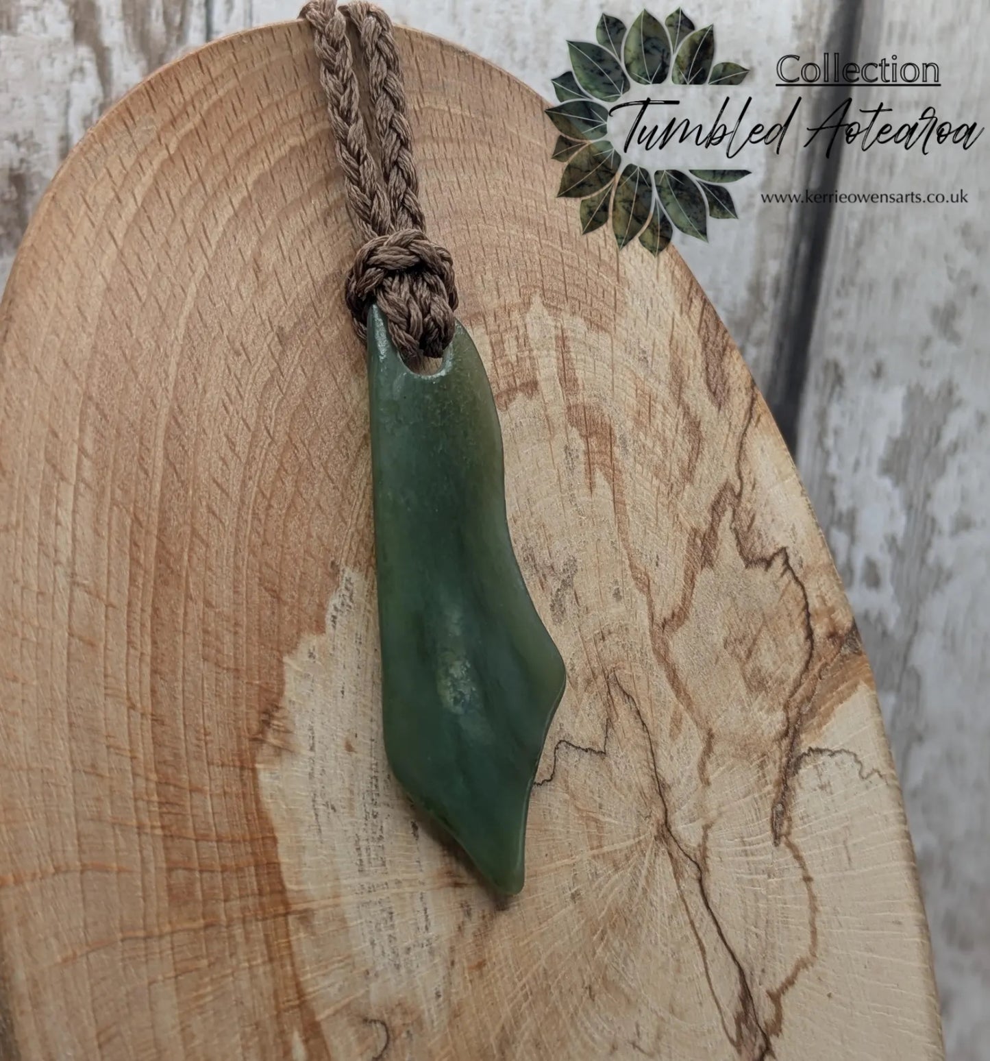 Large tumble Polished new Zealand pounamu greenstone jade pendant.