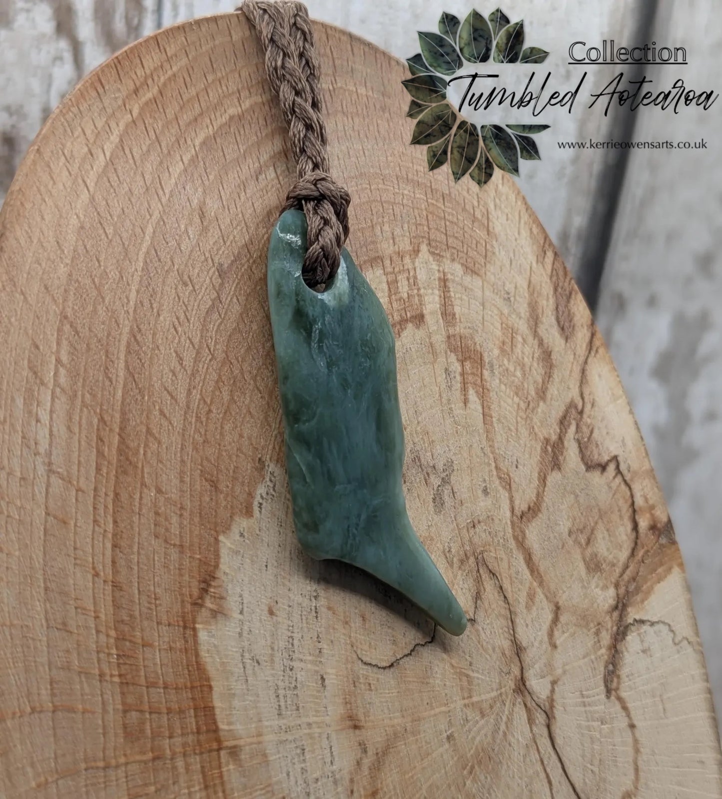 Tumble polished New Zealand pounamu greenstone jade pendant