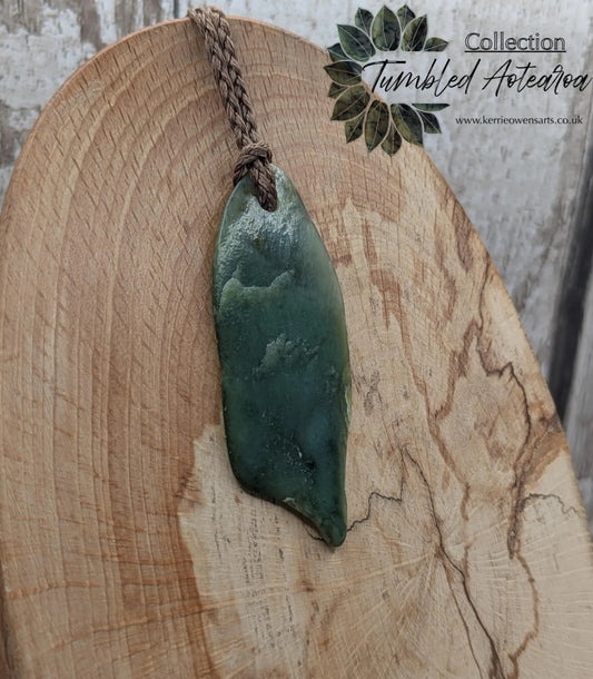 Tumble polished New Zealand pounamu greenstone jade pendant