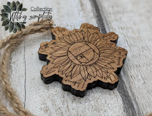 Tiny travel sized sunflower pendulum board, laser printed.