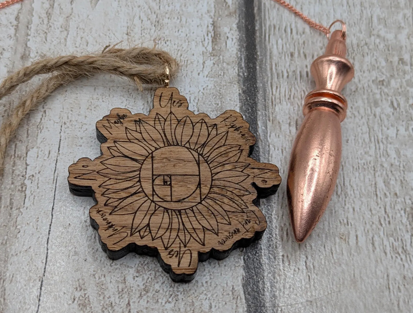Tiny travel sized sunflower pendulum board, laser printed.